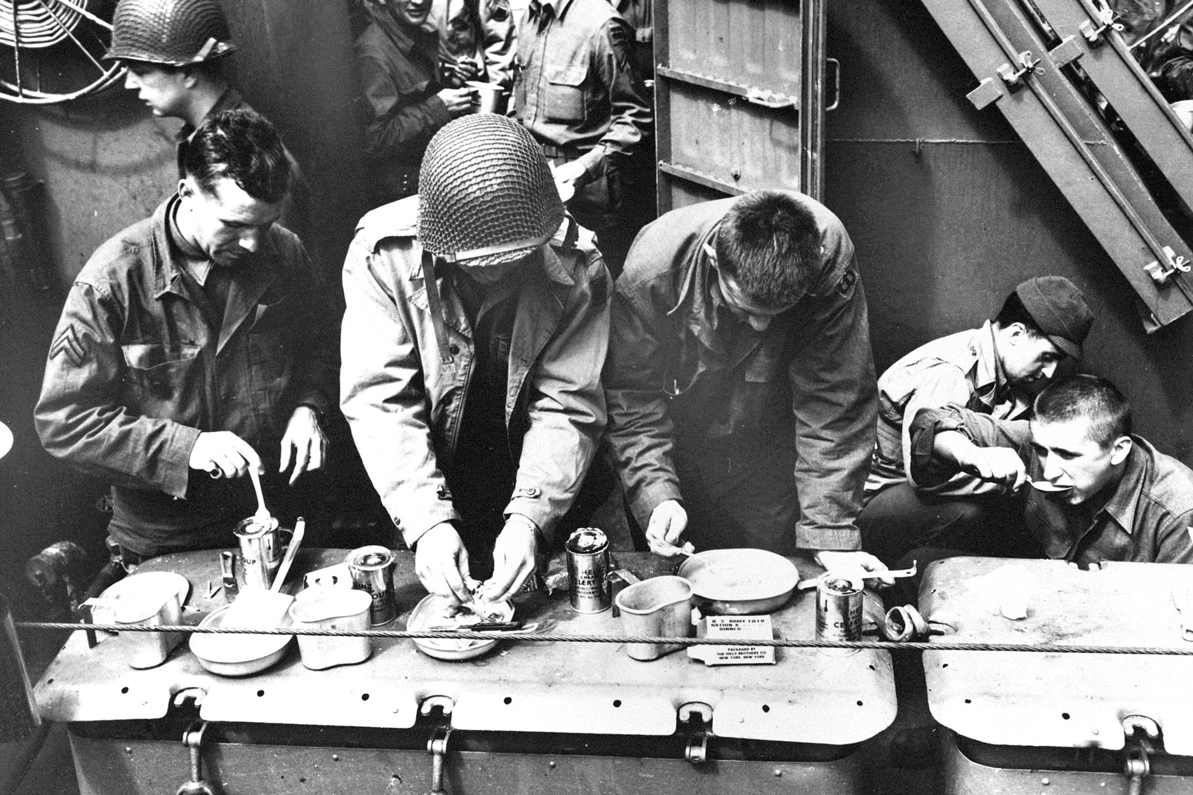 Soldiers eating their rations, 1944