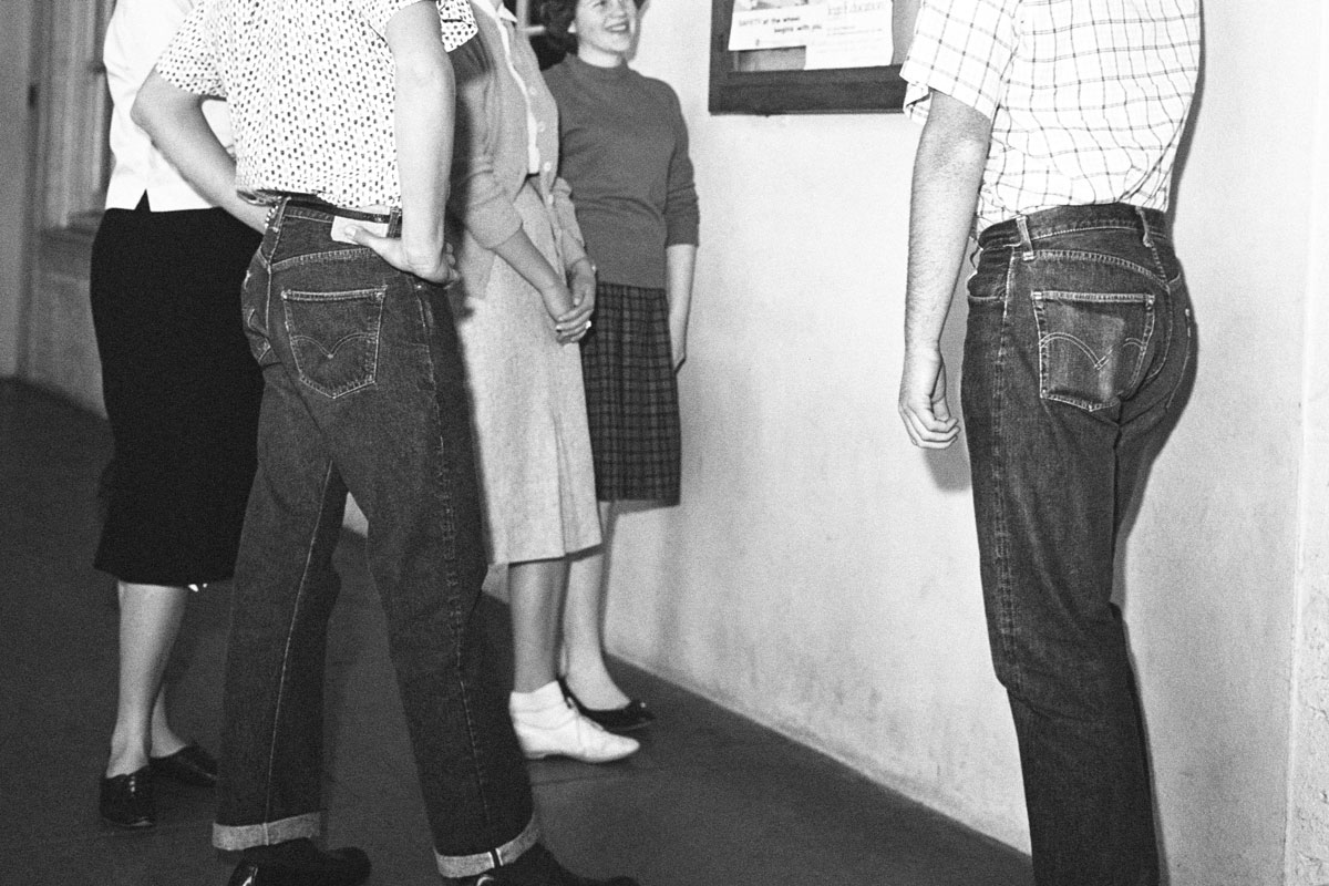 Young adults wearing jeans