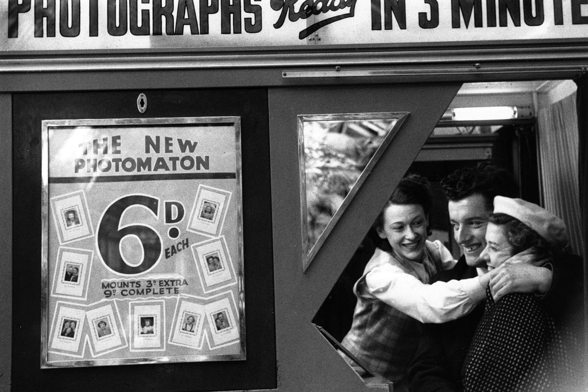 Friends in a photo booth, 1953