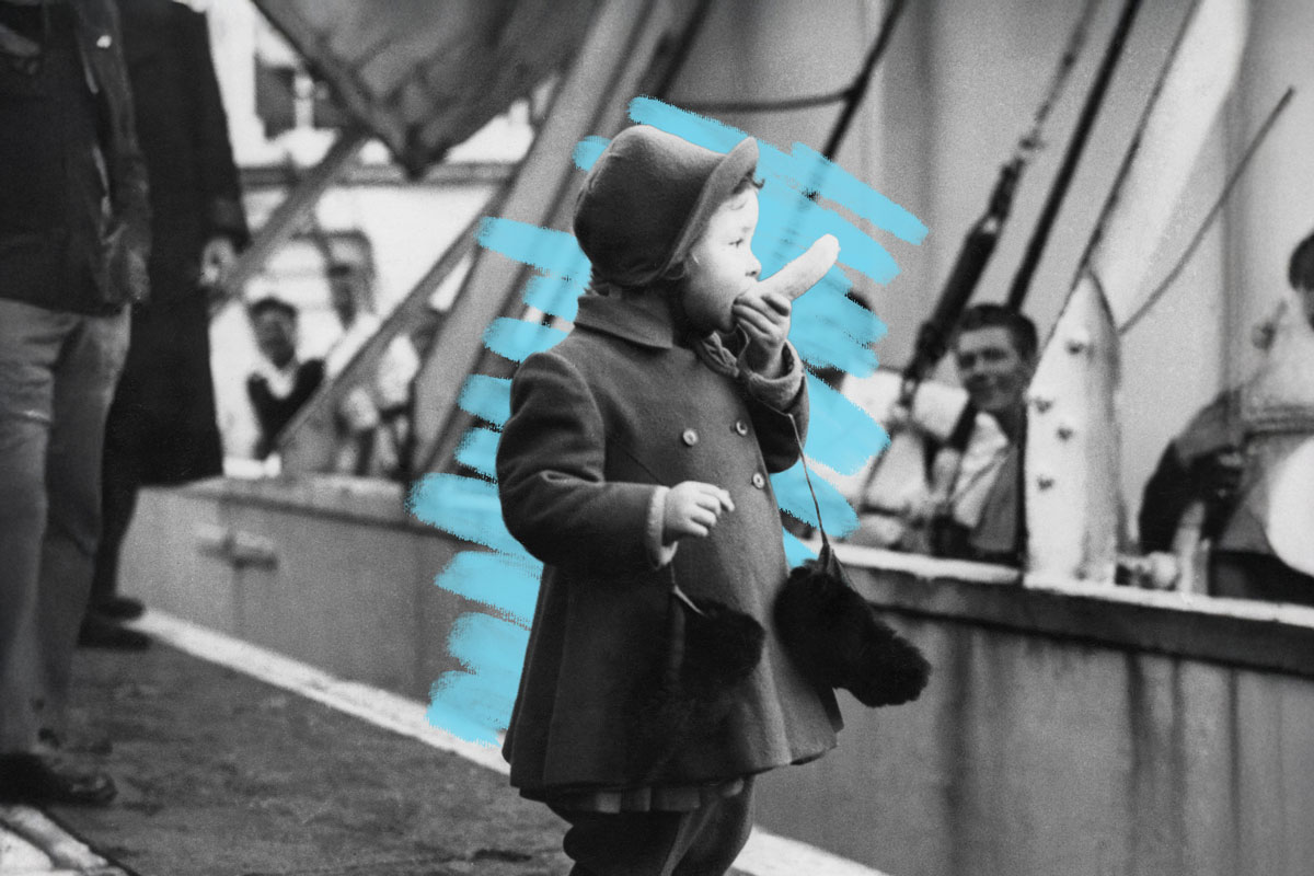 Little girl eating a banana, 1945