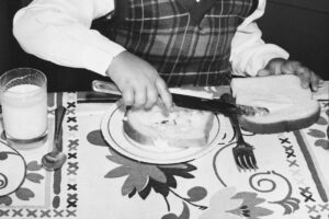 Girl buttering toast, circa 1940s