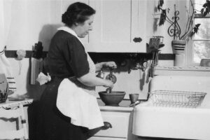 Woman using a hand mixer
